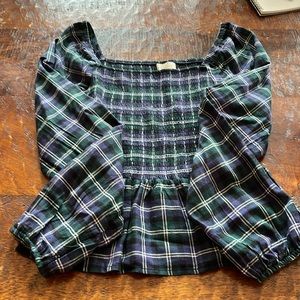 Smocked plaid peplum top